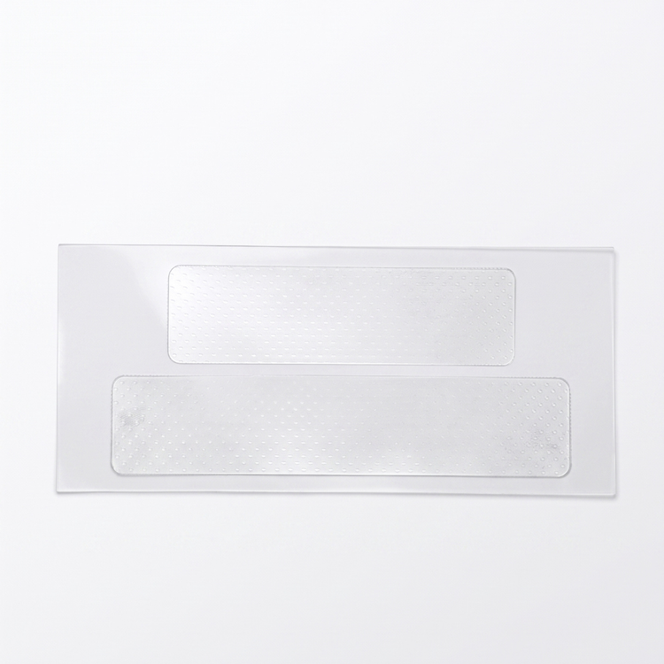 A clear rectangular plastic sleeve or cover with two horizontal textured white adhesive or adhesive-like panels, shown on a plain white background.